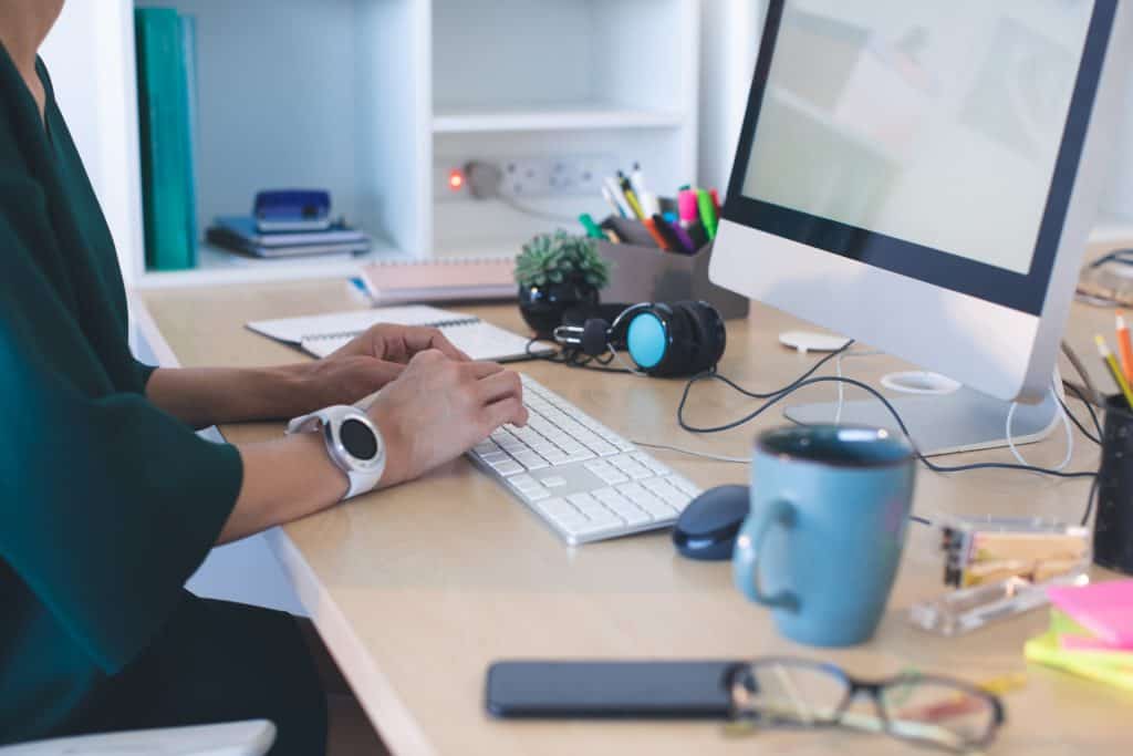 Business management shows female working on computer