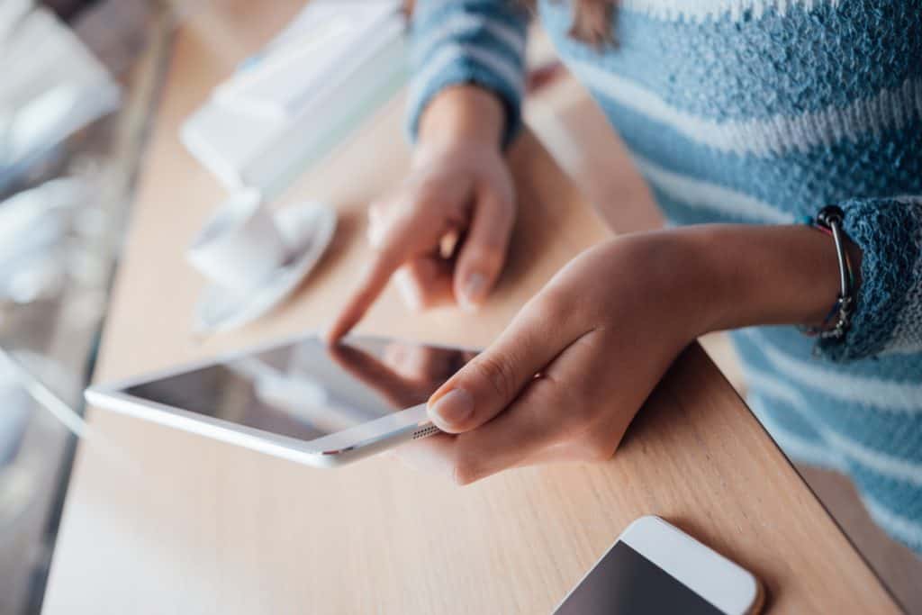 Woman using a touch screen tablet